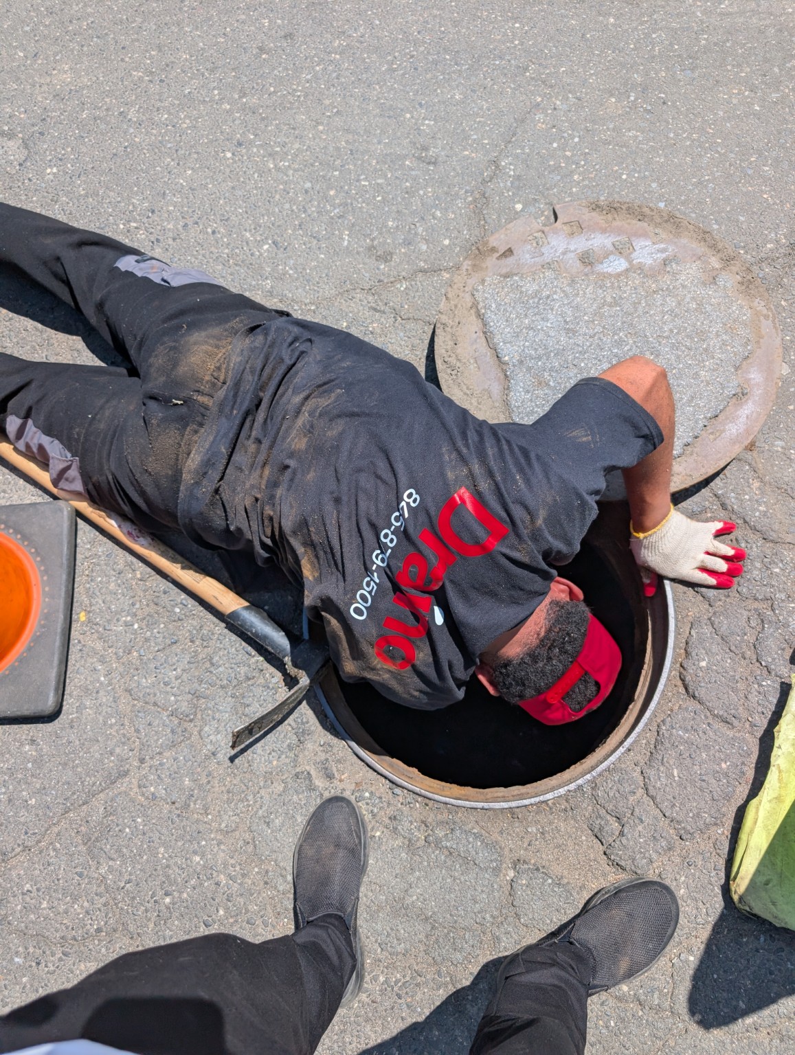 Draino technician accessing a sewer line